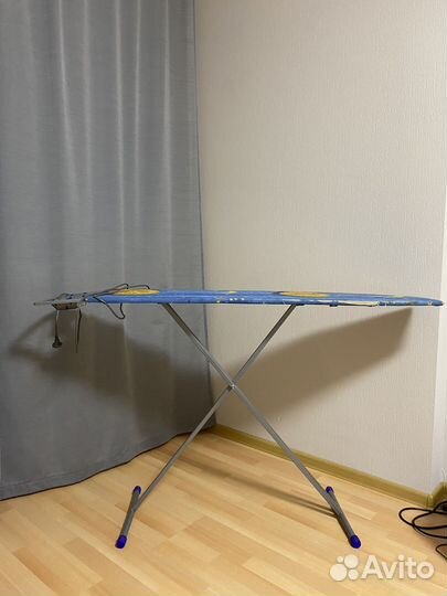 Гладильная доска с розеткой