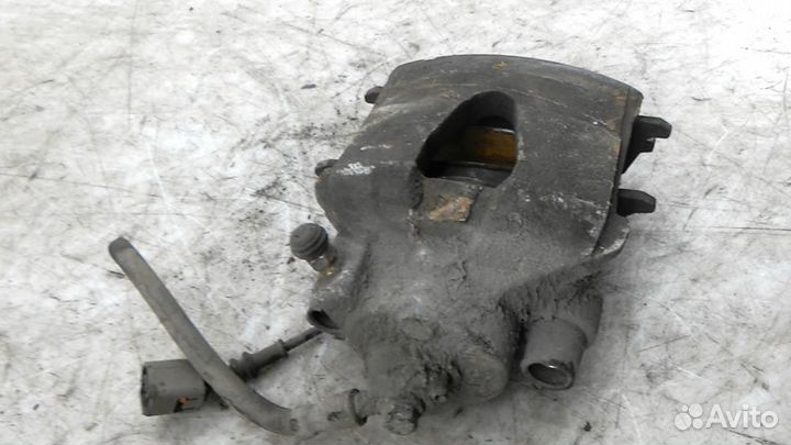 Суппорт тормозной передний левый на Skoda Octavia