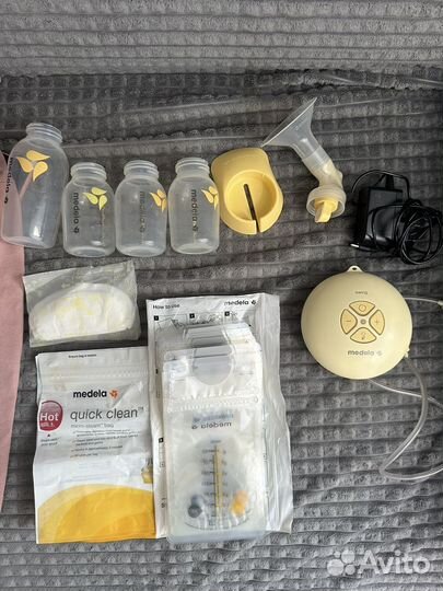 Молокоотсос medela электрический