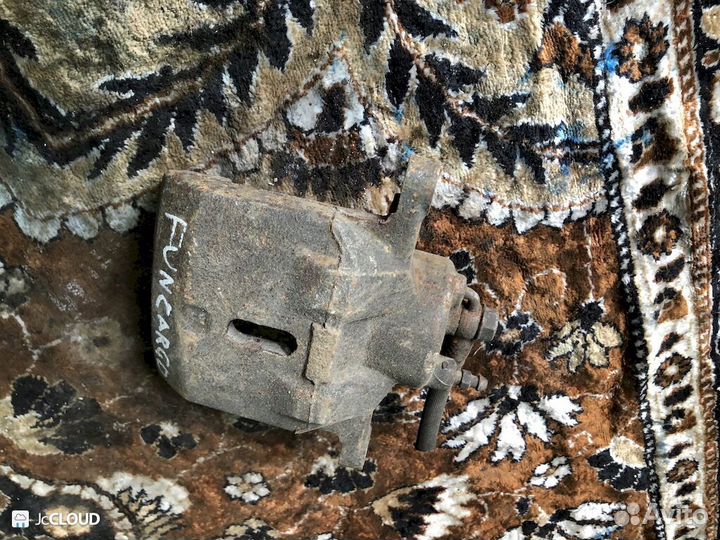 Суппорт на toyota funcargo NCP20