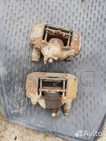 Тормозной суппорт Мазда Демио 1