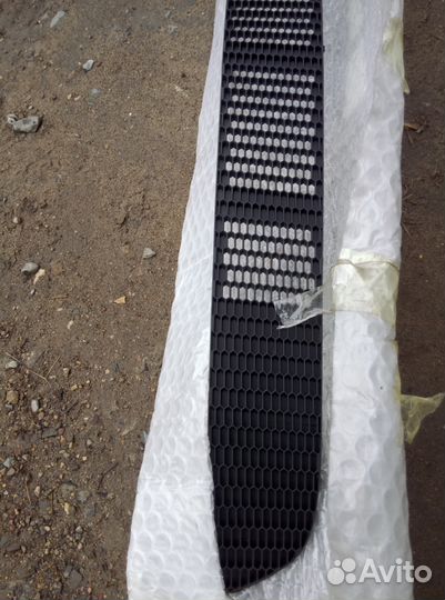 Решетка бампера Nissan almera 62254-BN700