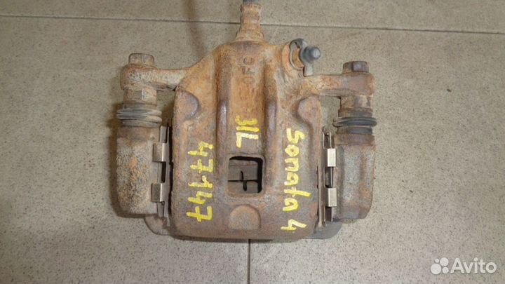 Суппорт задний левый Hyundai Sonata 4 (EF)