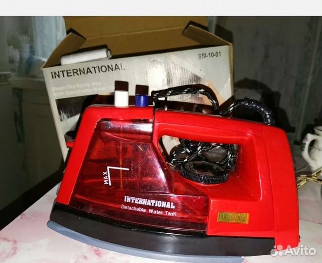 Новый утюг с отпаривателем