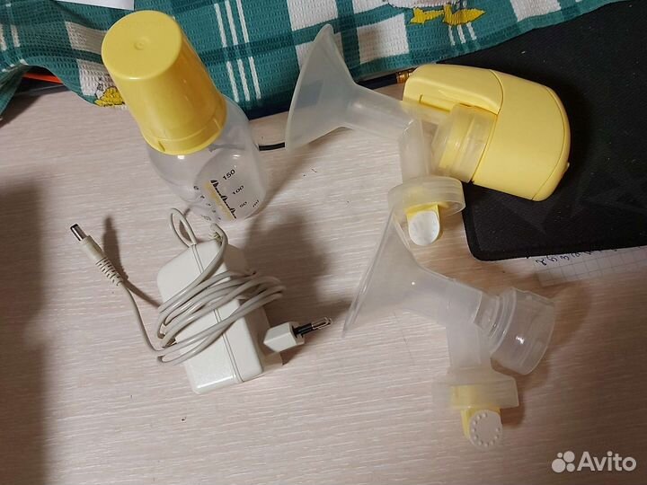 Молокоотсос medela электрический