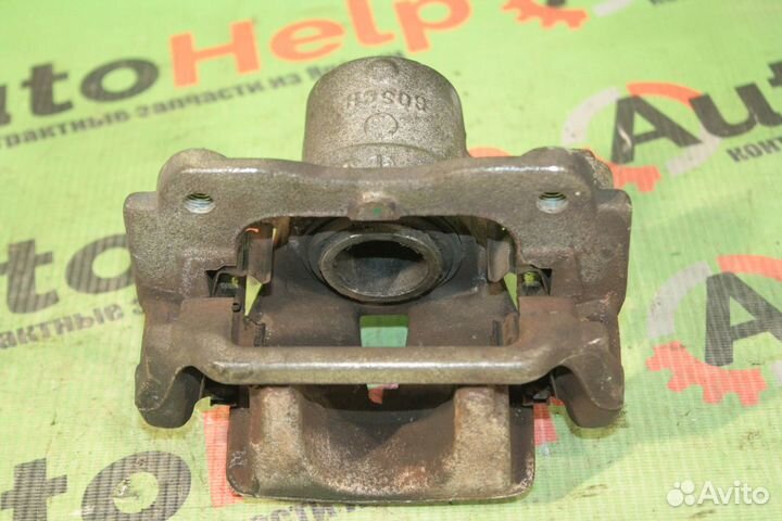 Суппорт toyota avensis AZT250 задний левый