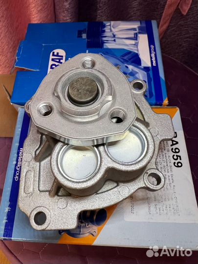 Помпа opel астра H J Cruze Vectra Aveo