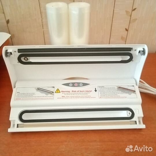 Вакуумный упаковщик