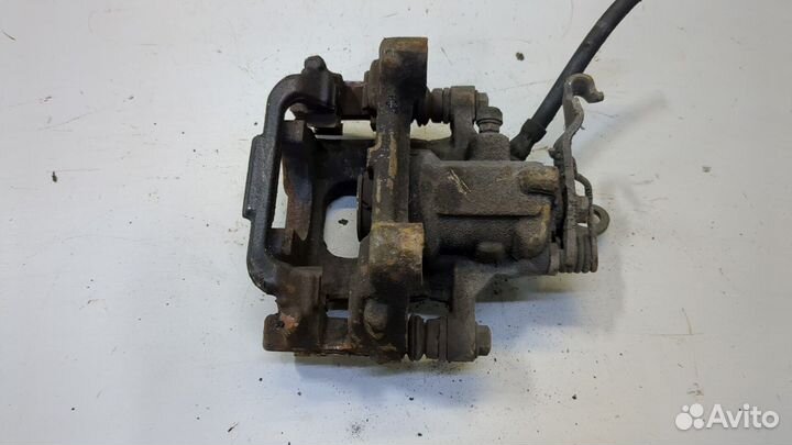 Суппорт левый задний Skoda SuperB