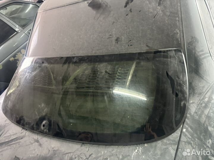 Стекло заднее Opel Astra H GTC