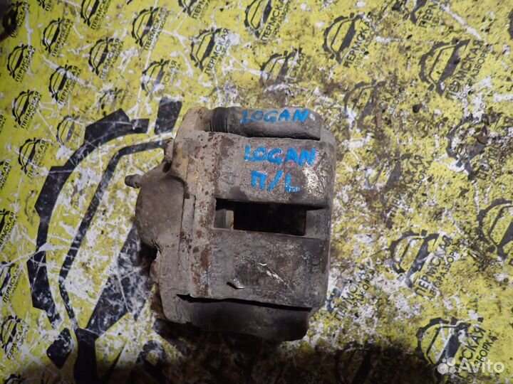 Суппорт тормозной передний левый Renault Logan 1