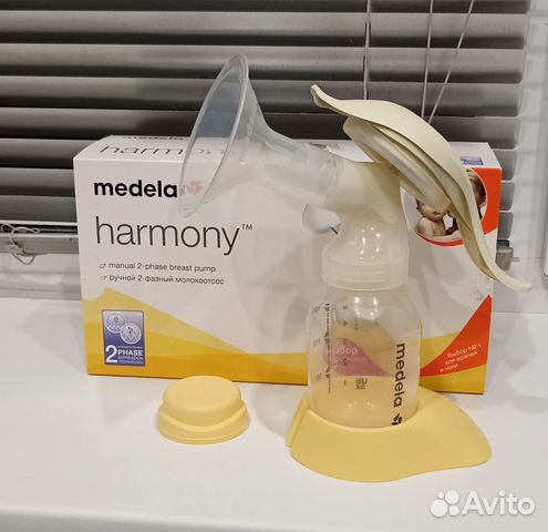 Молокоотсос ручной Medela + соска Calma+ накладки