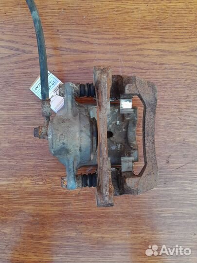 Суппорт задний левый Subaru Outback BR/B14