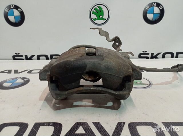 Суппорт тормозной передний правый Skoda Octavia A7