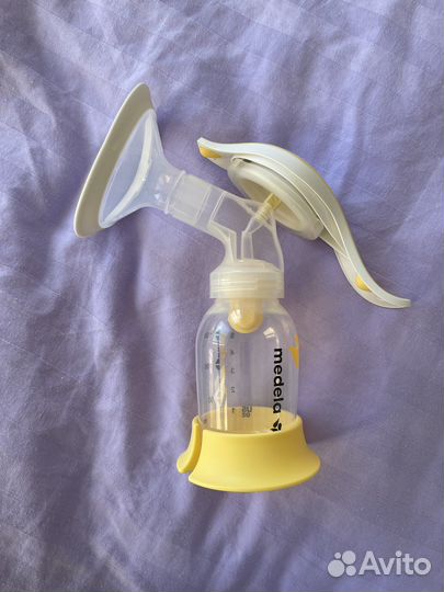 Ручной молокоотсос Medela +пакеты для сбора молока