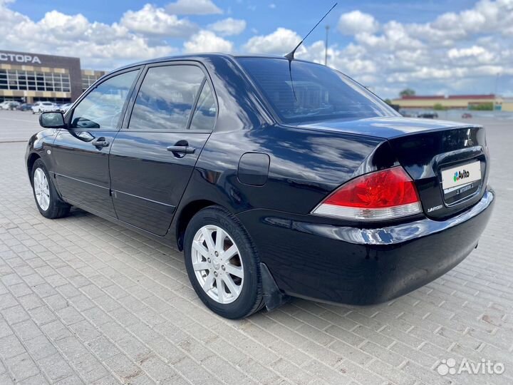 Mitsubishi Lancer 1.6 МТ, 2006, 295 000 км
