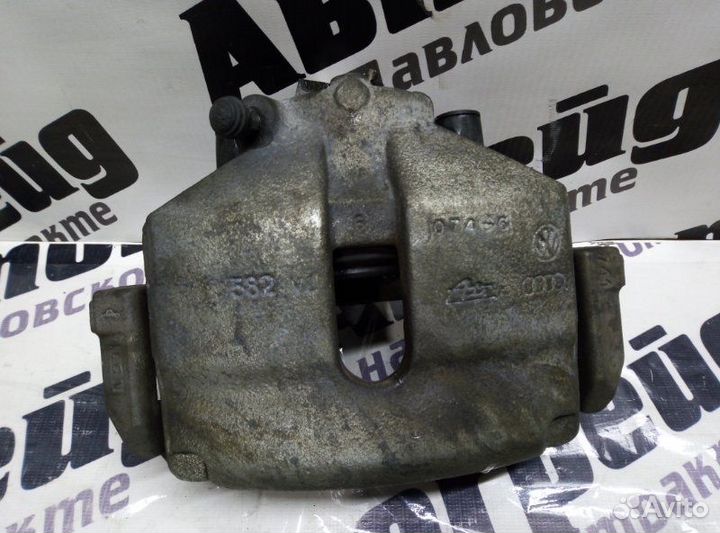 Суппорт тормозной передний правый Volkswagen