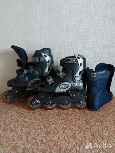 Роликовые коньки