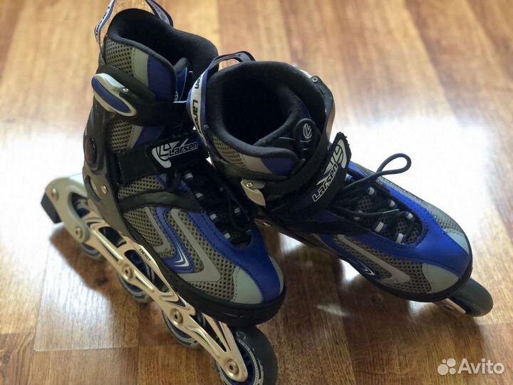 Роликовые коньки