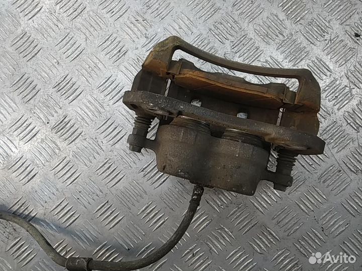 Суппорт передний правый Chevrolet Captiva