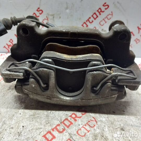 Суппорт тормозной передний левый Volkswagen Touran