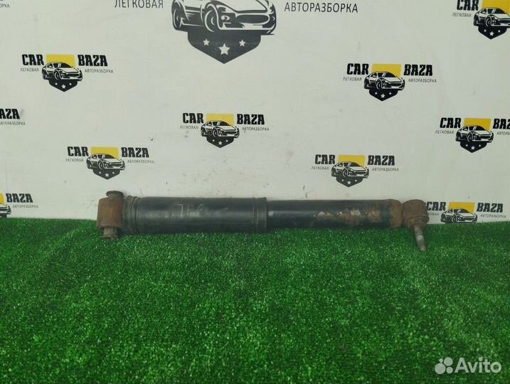 Амортизатор задний левый