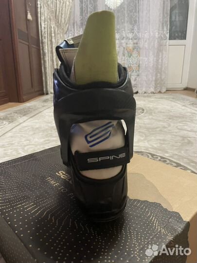 Лыжные ботинки коньковые spine