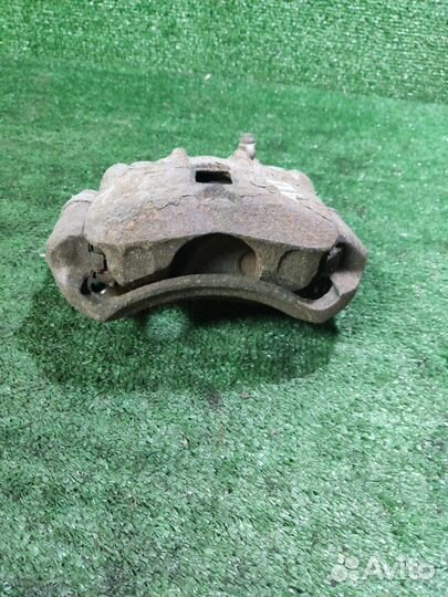 Суппорт тормозной передний левый Hyundai Getz