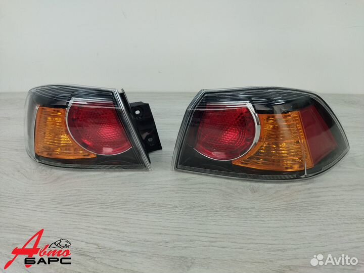 Фонарь левый/правый Mitsubishi Lancer X черный