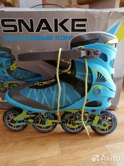 Роликовые коньки