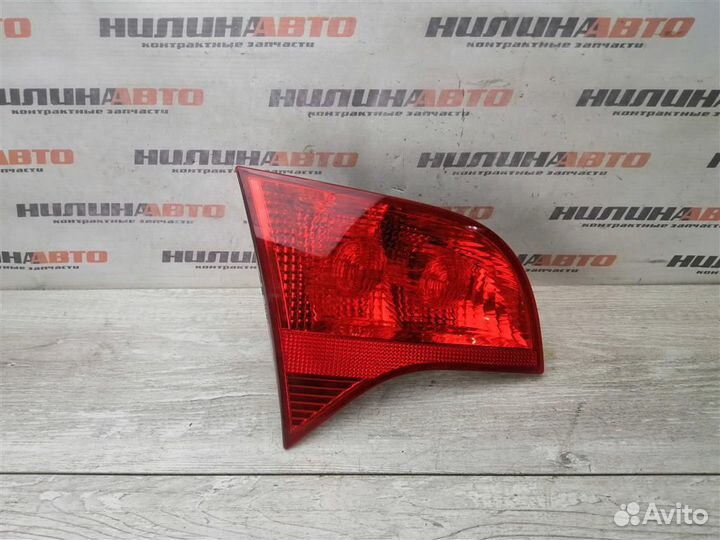 Фонарь левый в крышку багажника Ауди А4 Б7