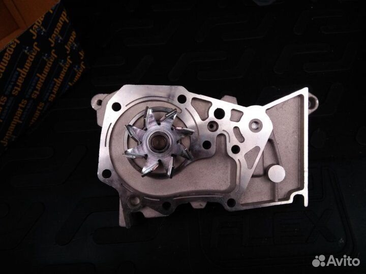 Помпа Ниссан Альмера g15 (водяной насос)