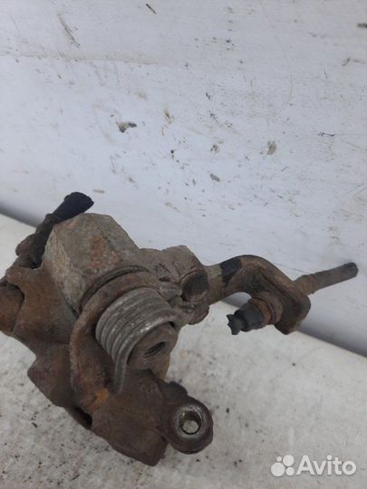 Суппорт тормозной задний левый Honda Civic хэтчбэк