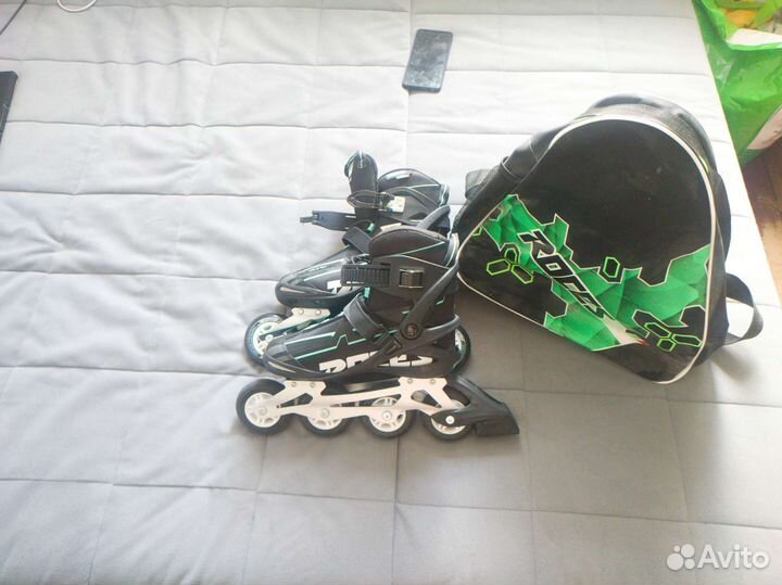 Роликовые коньки roces