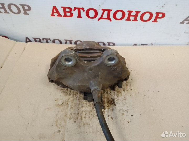 Суппорт тормозной задний левый Mercedes-Benz