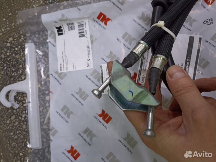 Трос стояночного тормоза Opel Astra