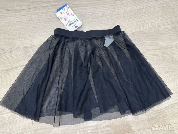 Гимнастический купальник и юбка