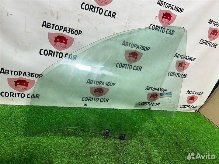 Стекло двери переднее левое Nissan Terrano D10