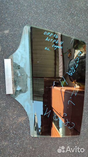 Стекло двери заднее левое Opel Astra H седан