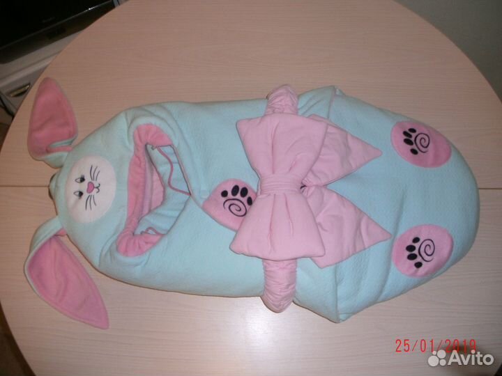 Теплый конверт на прогулку со съемной овчиной