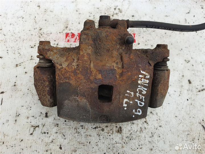 Суппорт передний левый Митсубиши Лансер 9