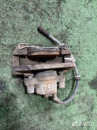 Суппорт тормозной передний левый Ford Focus II (20