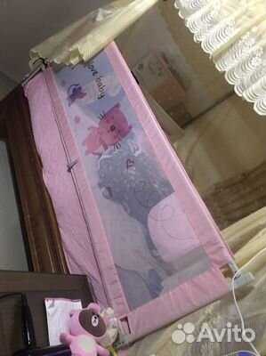 Защитный бортик для кровати розовый