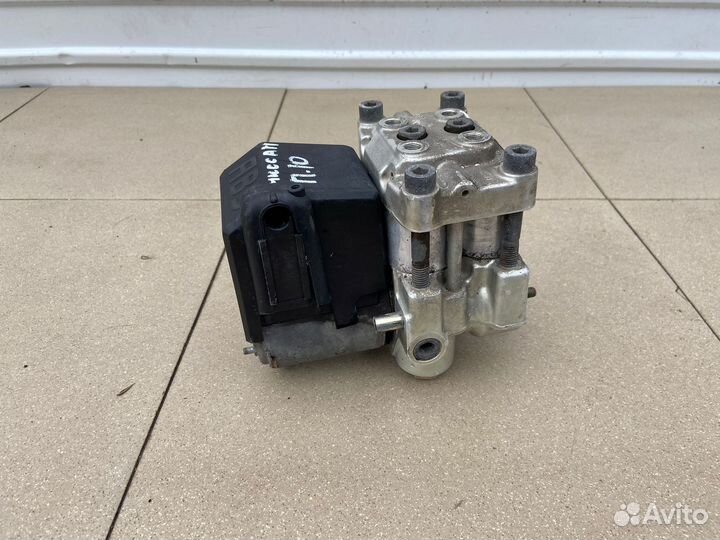 Блок абс Nissan Primera P10