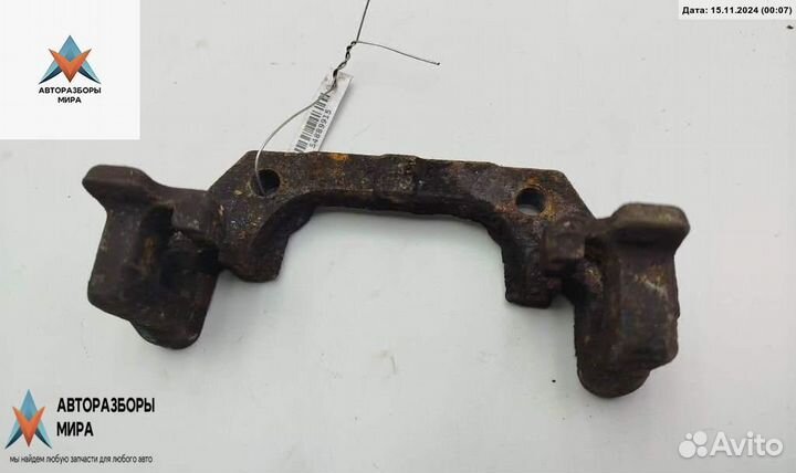 Скоба суппорта Opel Vectra C рест. 2008