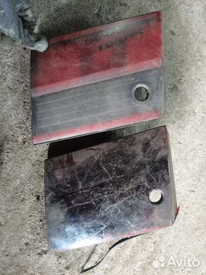 Фонарь багажника правый carina e