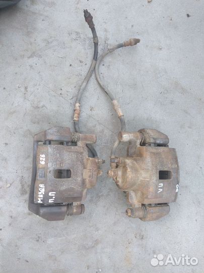 Суппорт тормозной передний Mazda 626 GE 1992-1997