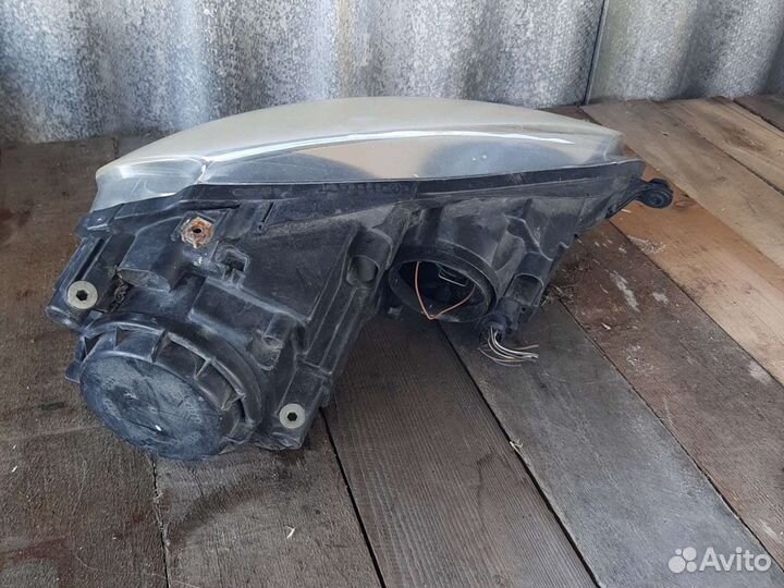 Фара левая VW Golf 5 1K6941005E