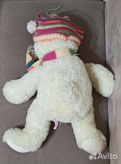 Aurora Медведь кремовый в шапке 50см