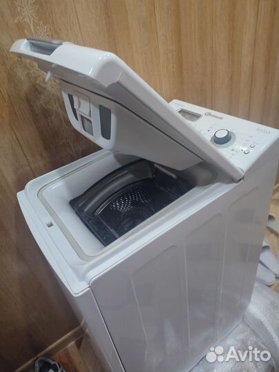 Стиральная машина с вертикальной загрузкой